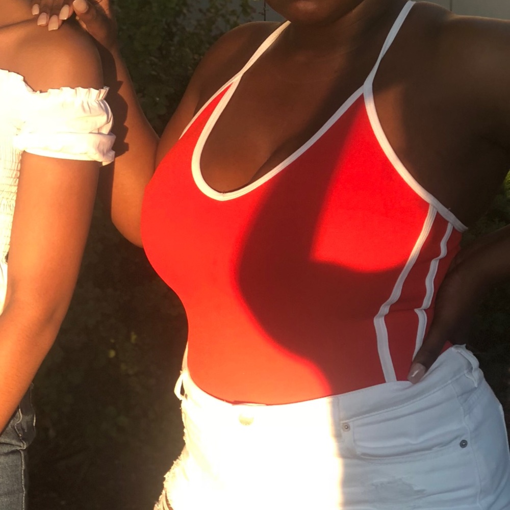 Red and white bodysuit